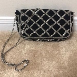 Black shoulder back with silver accents